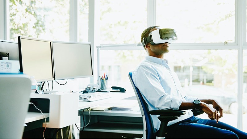 Man at work using VR tools