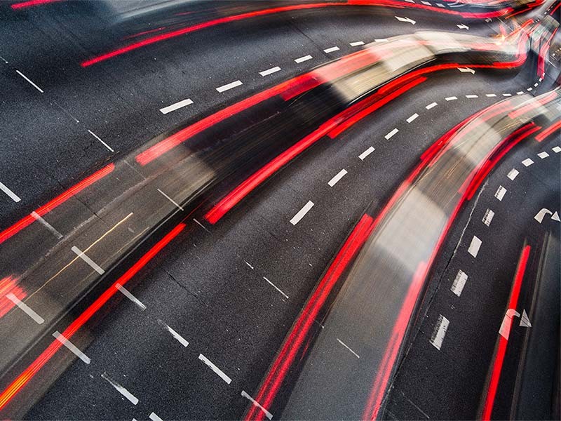 fast paced traffic on highway road