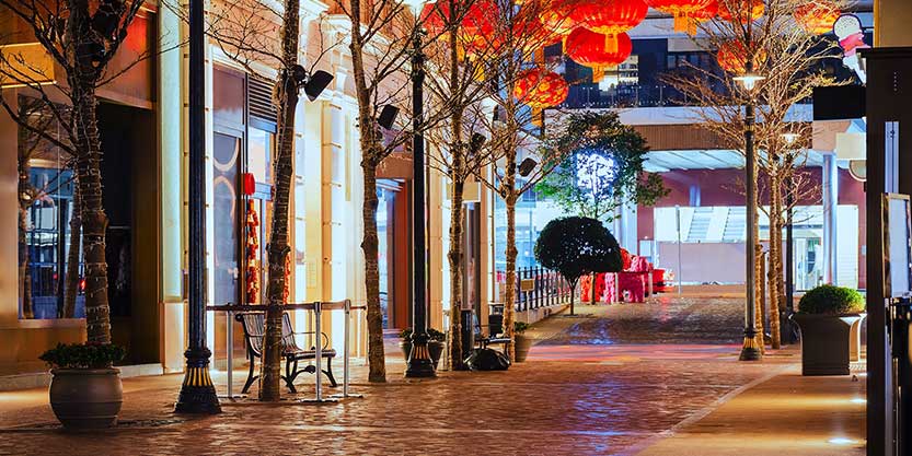 Empty night street illuminated by the lantern. City downtown during the quarantine. Hong Kong