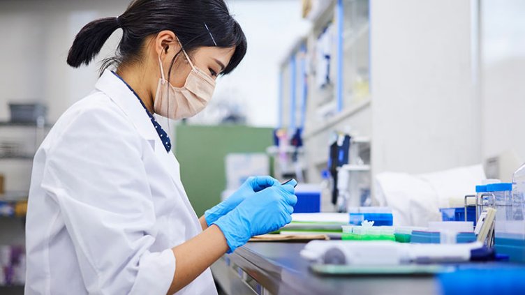 A girl working on Lab