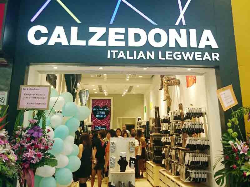 People shopping legwear at Calzedonia Italian Fashion Store