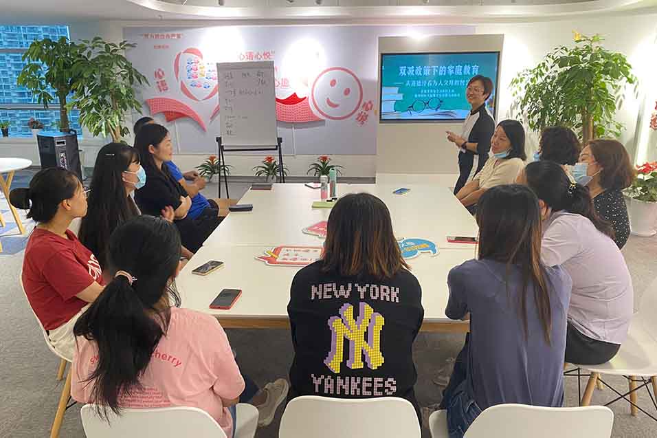 Employees discussing at conference room