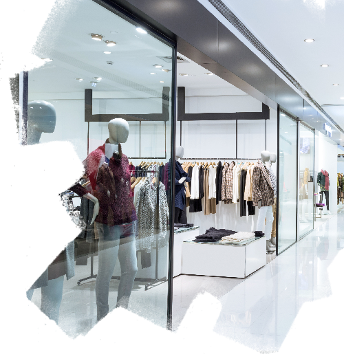 Entrance of fashionable clothes store in shopping mall