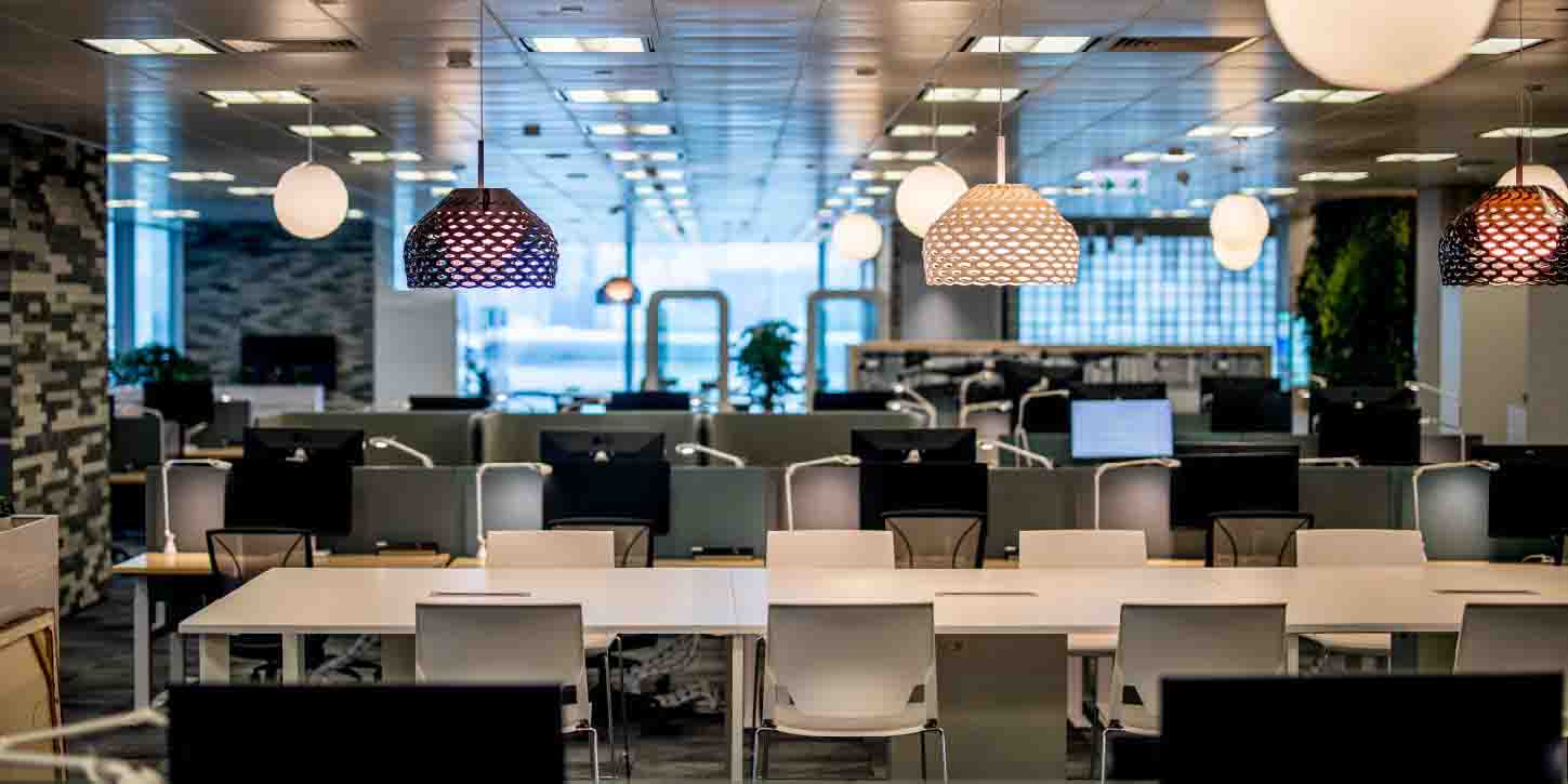 Ceiling hanging lights in the office workstation