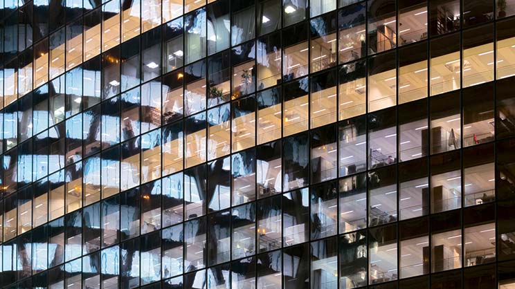 Glass building during night time