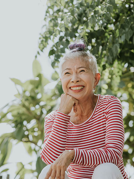 Portrait of smiling Asian senior woman