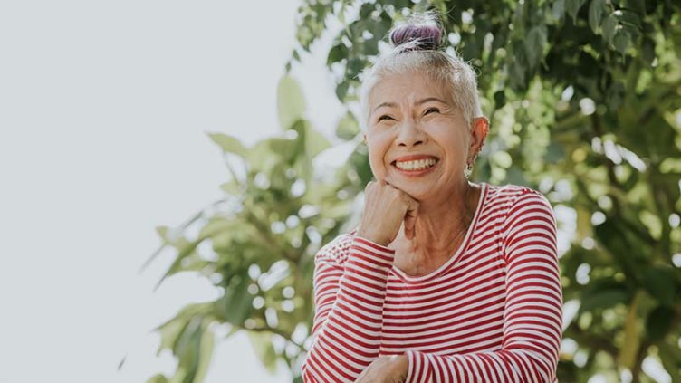 Portrait of smiling Asian senior woman