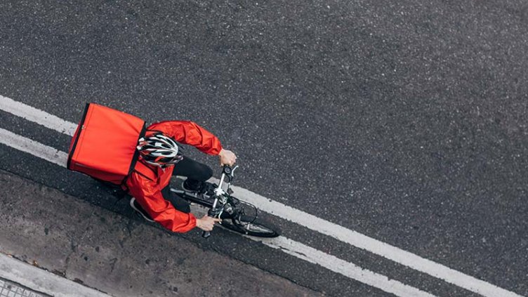 logistics sector delivery person going to deliver the package