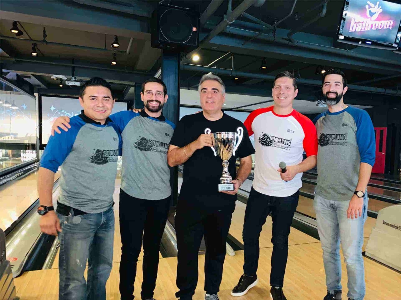 Wining team of JLL with Trophy