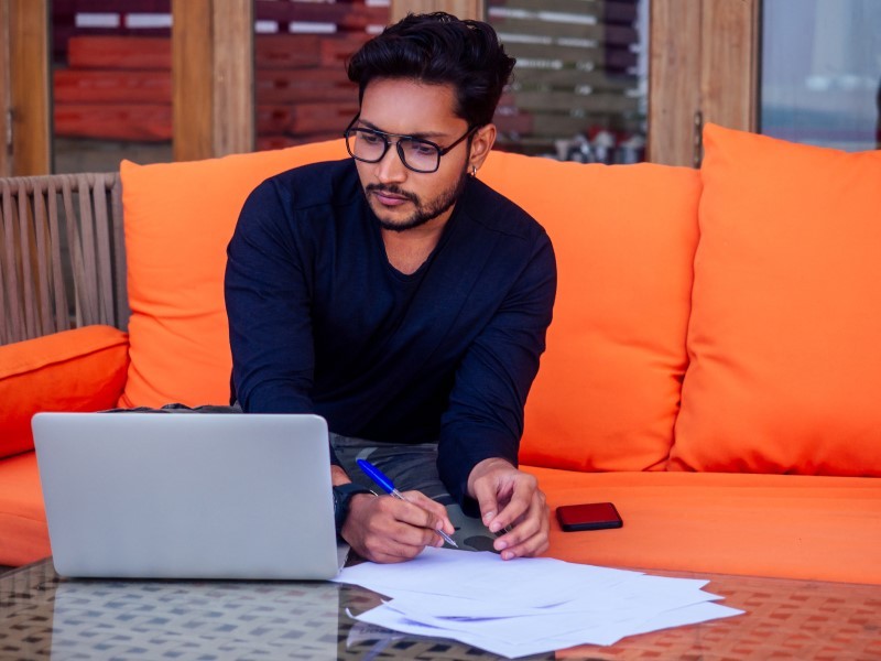 View of a man working in JLL office passionately