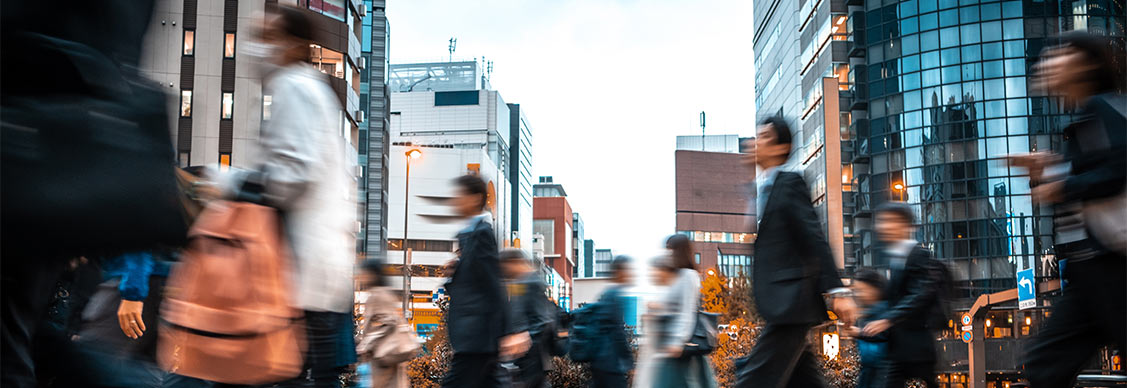  People walking on the street with a blurred effect