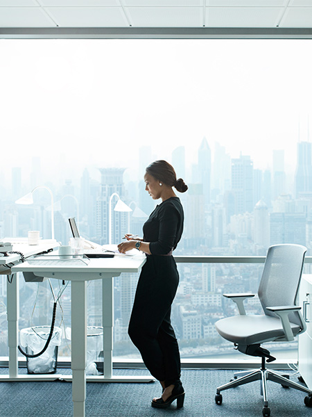 A woman working in a laptop