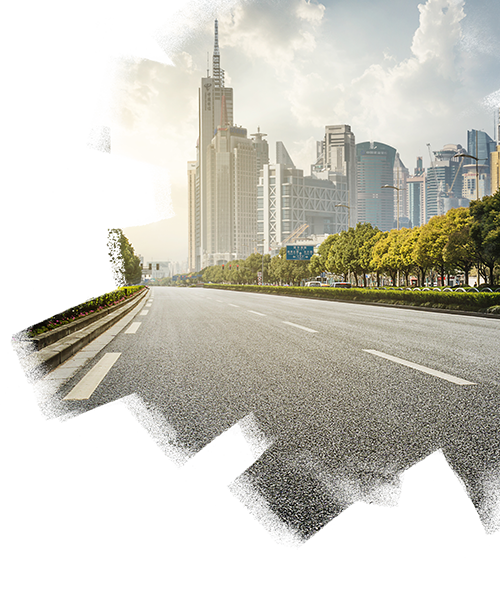 View of a road beside high rise real estate buildings