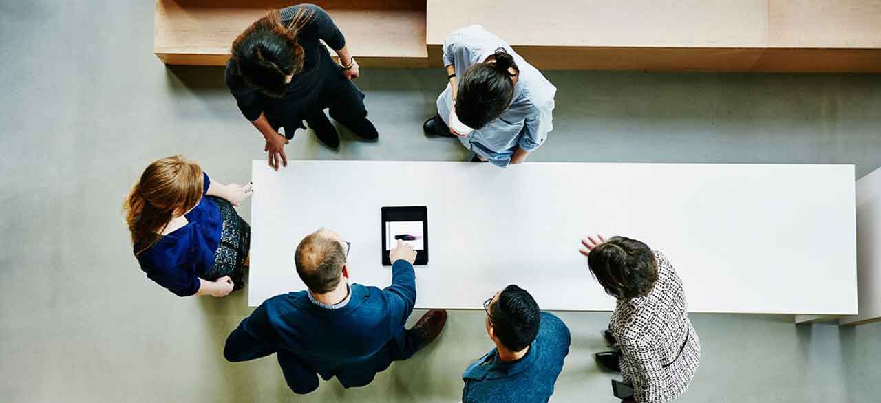 business collegues  discussing project in office